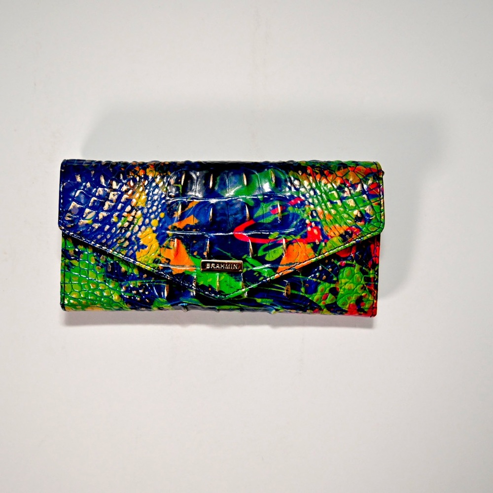 Brahmin wallet. Tropical print. Primary color is navy/green.